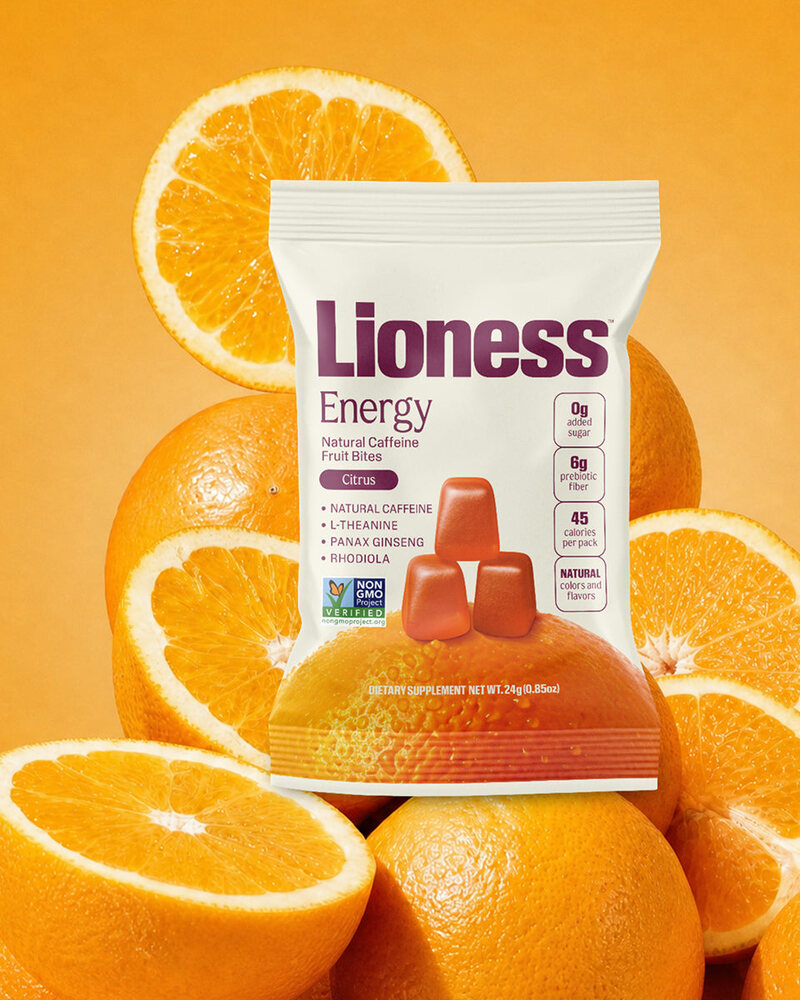 Lioness Energy on a field of oranges